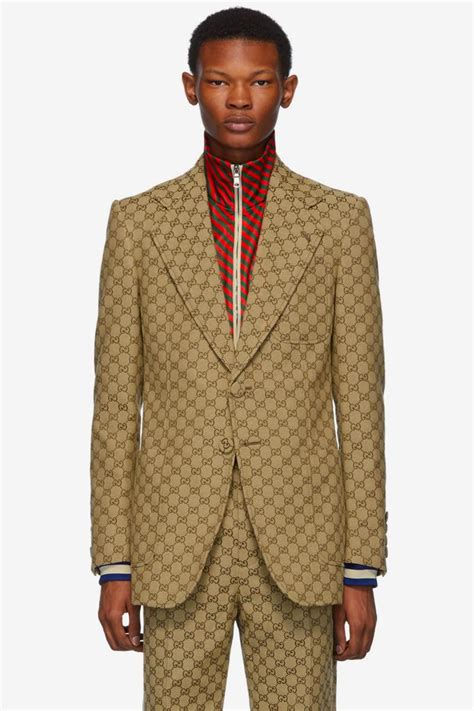 gucci logo suit|who makes Gucci suits.